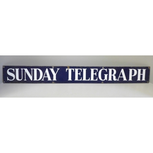 636 - A Sunday Telegraph enamel metal sign, 76cm and a set of balance scales