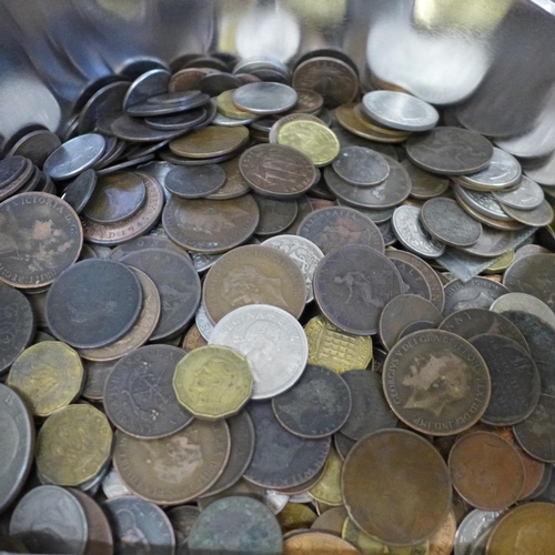 655 - Two tins of British and foreign coins