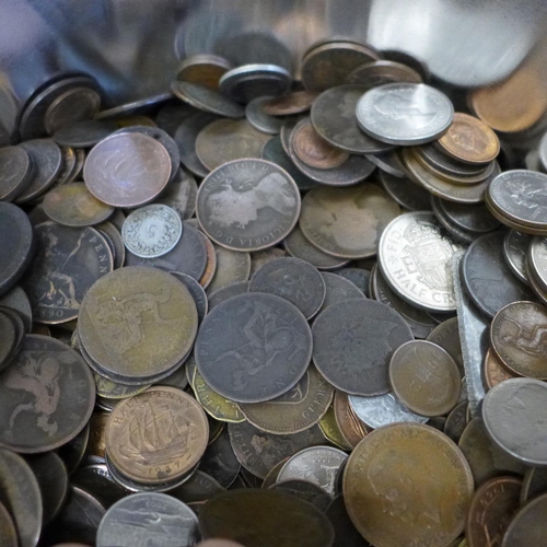 655 - Two tins of British and foreign coins