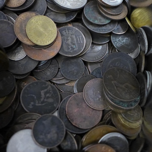 655 - Two tins of British and foreign coins