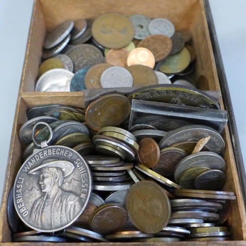 655 - Two tins of British and foreign coins