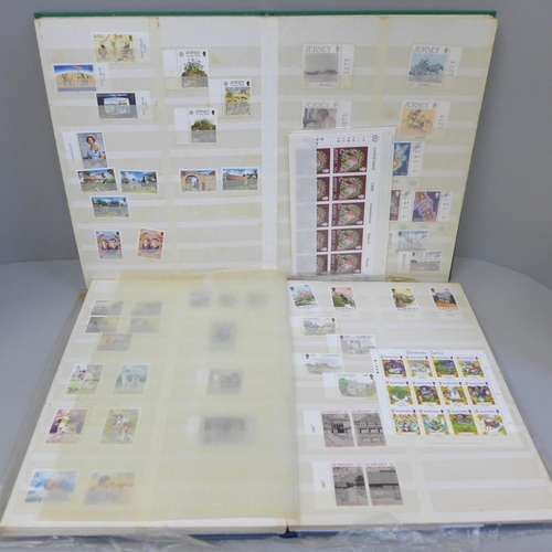 659 - Two albums of stamps, mint Jersey and Guernsey