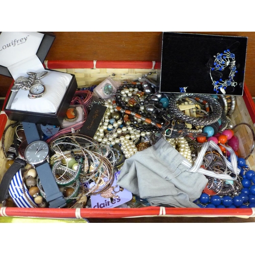 665 - A basket of costume jewellery and watches