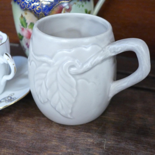 667 - A Carlton Ware jug, two Edward VII commemorative cups and saucers, a commemorative cream jug and sug... 