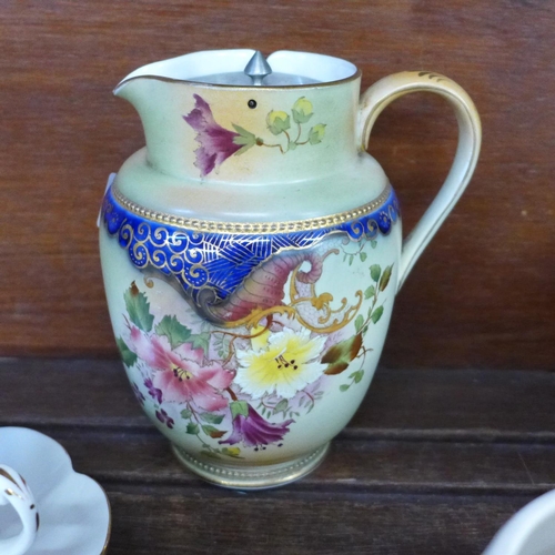 667 - A Carlton Ware jug, two Edward VII commemorative cups and saucers, a commemorative cream jug and sug... 