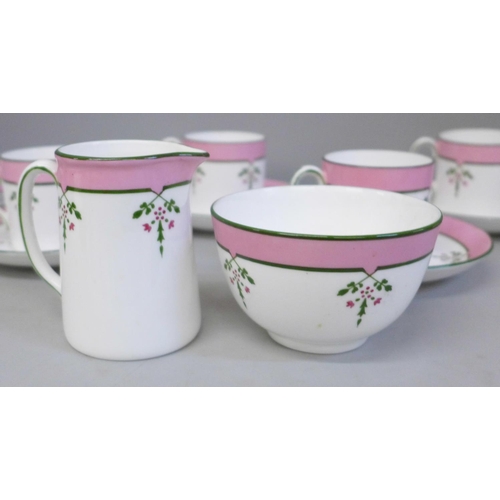 670 - A Hammersley Art Deco style coffee set; six cups, seven saucers, cream and sugar, one cup a/f