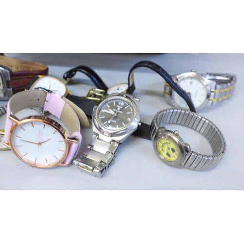 674 - A collection of lady's and gentleman's wristwatches