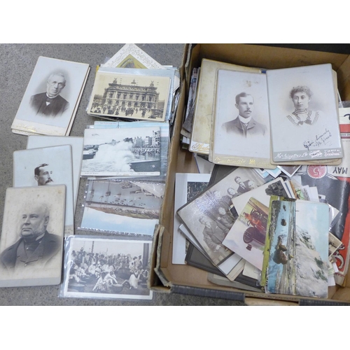 688 - A collection of approximately 150 postcards, playing cards and cabinet cards