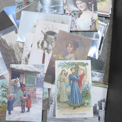 690 - A collection of 250 postcards, vintage to modern