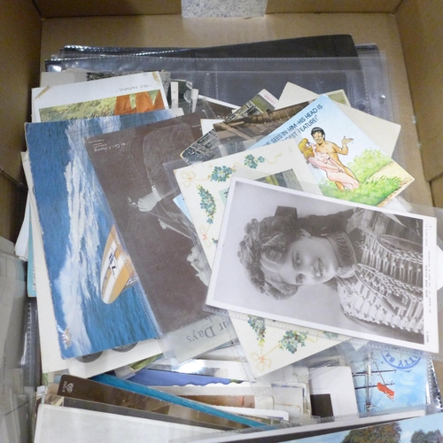 690 - A collection of 250 postcards, vintage to modern