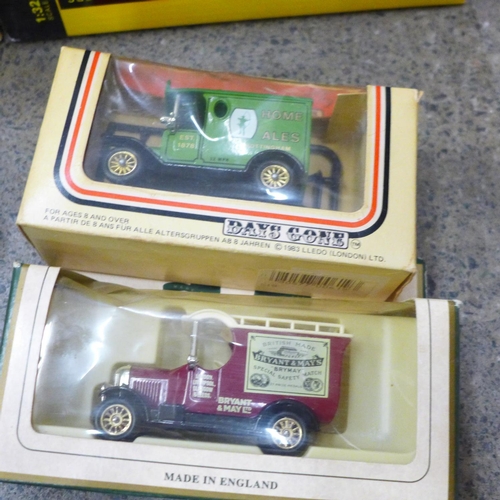 692 - Four model vehicles; three Britains JCB, a Fordson Power Major by Universal Hobbies and other model ... 