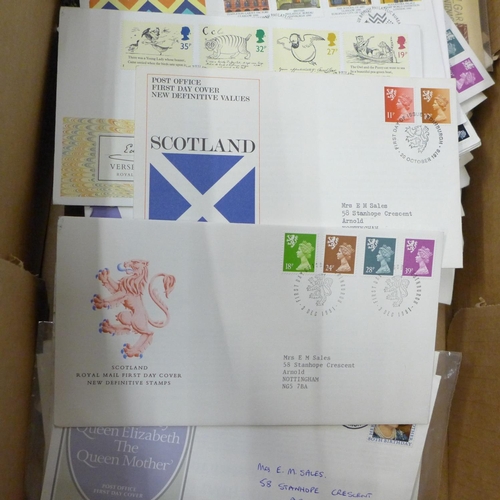 693 - Approximately 150 first day covers and an empty stamp album