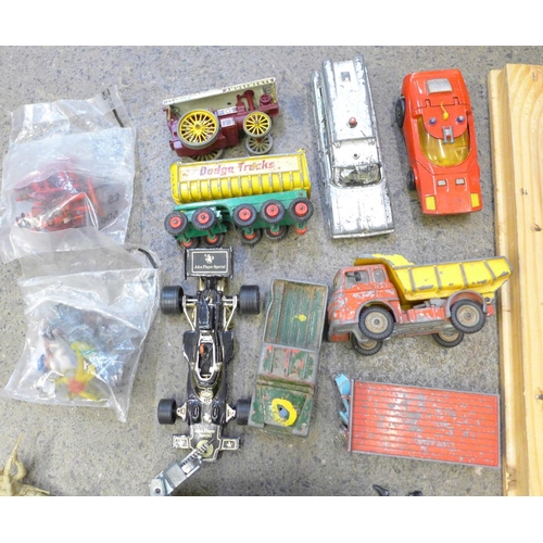 697 - A collection of plastic toy soldiers, die-cast model vehicles, Dinky, Corgi and Matchbox, playworn, ... 