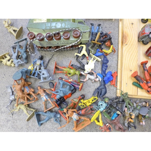 697 - A collection of plastic toy soldiers, die-cast model vehicles, Dinky, Corgi and Matchbox, playworn, ... 