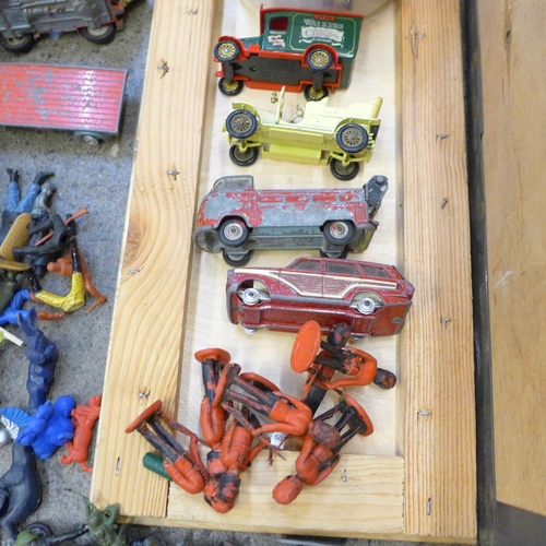 697 - A collection of plastic toy soldiers, die-cast model vehicles, Dinky, Corgi and Matchbox, playworn, ... 