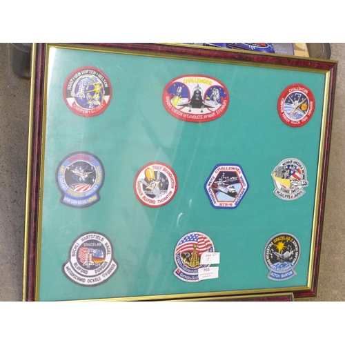 703 - Moon landing related items including two framed sets of pilot patches, holographic images, ephemera,... 