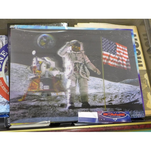 703 - Moon landing related items including two framed sets of pilot patches, holographic images, ephemera,... 