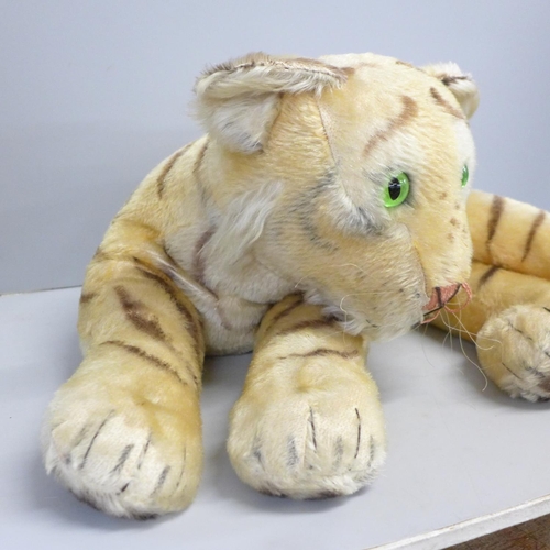 765 - A vintage Steiff recumbent tiger