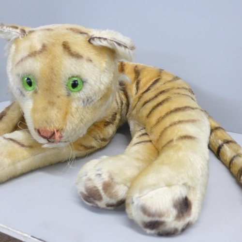 765 - A vintage Steiff recumbent tiger