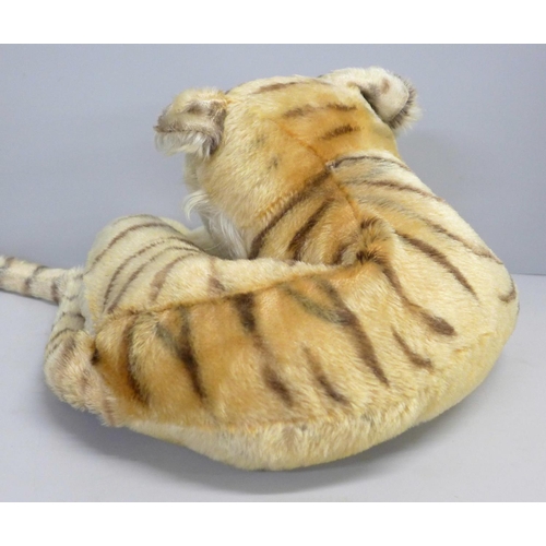 765 - A vintage Steiff recumbent tiger