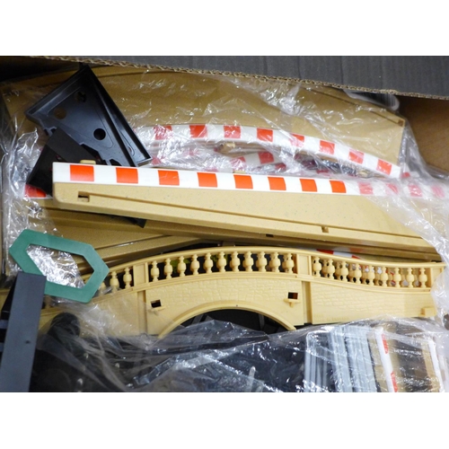 A Scalextric Mini Car Racing Set, a large amount of track and fencing ...