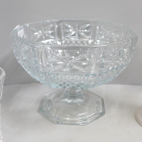 A cut glass decanter and faceted ball stopper, cut glass water jug, a