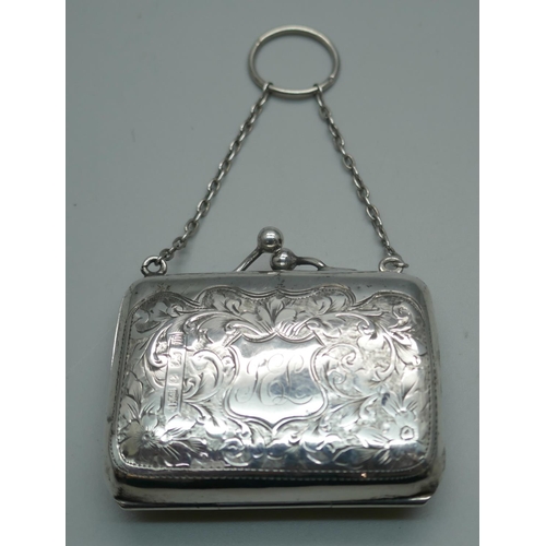 859 - A small hand engraved silver purse, Birmingham 1911, interior a/f