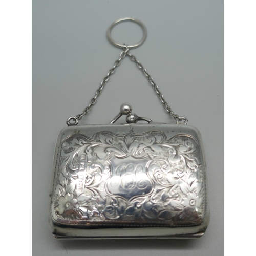 859 - A small hand engraved silver purse, Birmingham 1911, interior a/f