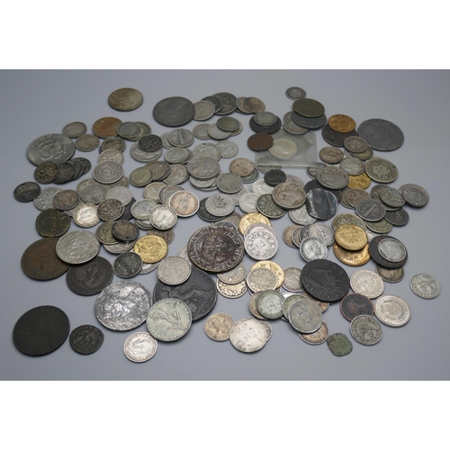 889 - Coins; a Victorian one penny model, silver 3d coins, other silver coins, British and world coins, al... 