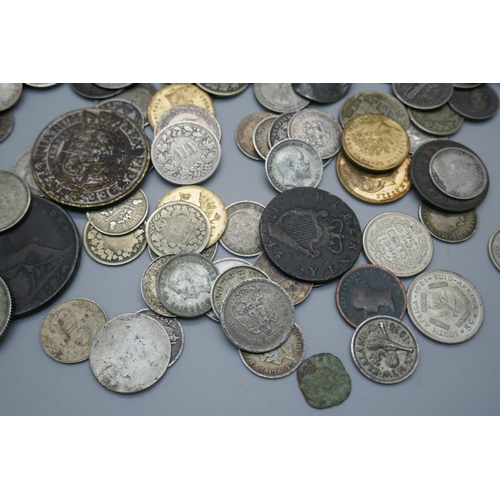 889 - Coins; a Victorian one penny model, silver 3d coins, other silver coins, British and world coins, al... 