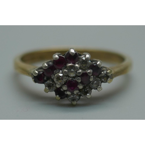 906 - A silver gilt, diamond and ruby cluster ring, L/M