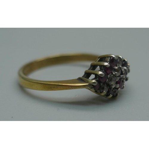 906 - A silver gilt, diamond and ruby cluster ring, L/M