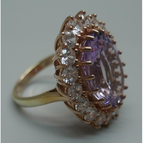 909 - A silver gilt, amethyst and zircon cocktail ring, V