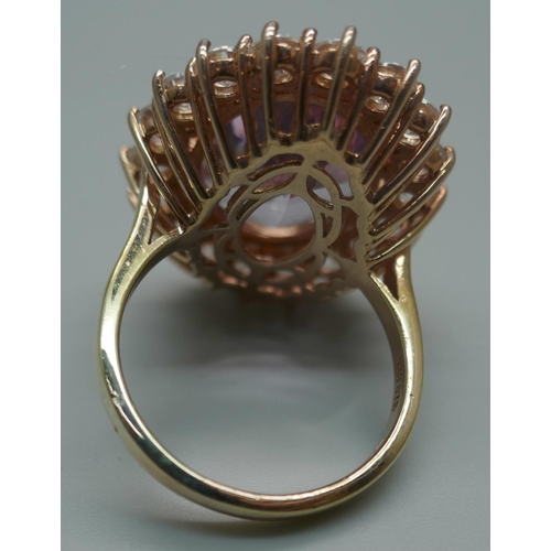 909 - A silver gilt, amethyst and zircon cocktail ring, V