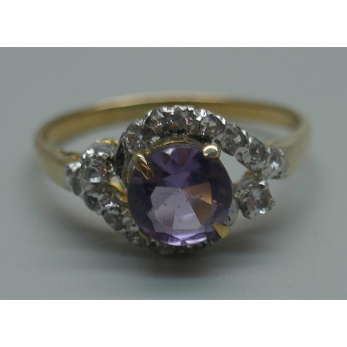 914 - A yellow metal, amethyst and white stone cluster ring with continental marks, 1.8g, O