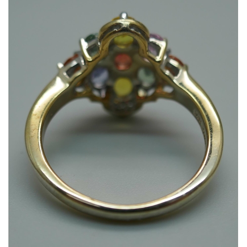 915 - A silver gilt, multi-colour sapphire and white topaz cluster ring, T/U