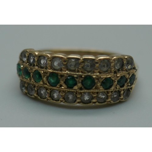 918 - A 9ct gold, three row emerald and white stone ring, 3.7g, R