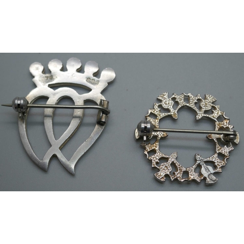 923 - A Scottish silver Luckenbooth brooch by Thomas Kerr Ebbutt and a silver thistle brooch