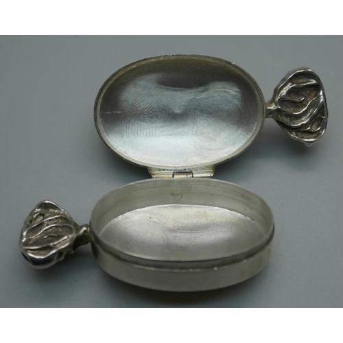 928 - A novelty silver gem set pill box in the form of a sweet