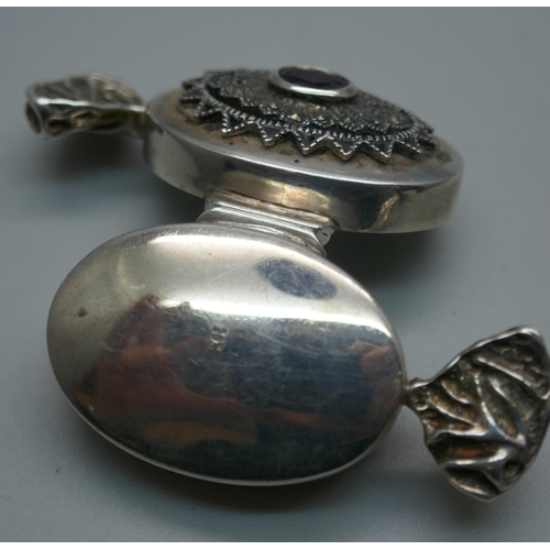 928 - A novelty silver gem set pill box in the form of a sweet