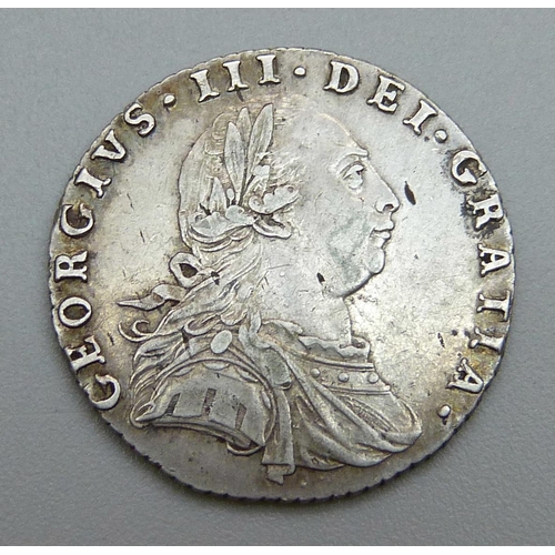 934 - A 1787 George III sixpence