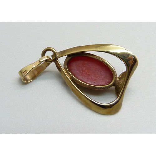 952 - A yellow metal and coral pendant, marked 333, 2.7g