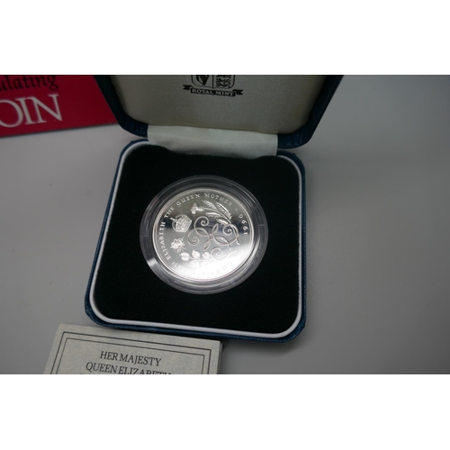 956 - A £5 coin, The World's First decimal circulating £5 coin, a £1 silver proof Remembrance Day 2018 coi... 