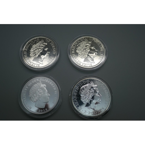 958 - A 2007 silver Britannia £2 coin, a 2014 silver Jersey D-Day £5 coin, a 2014 WWI Centenary £5 coin an... 