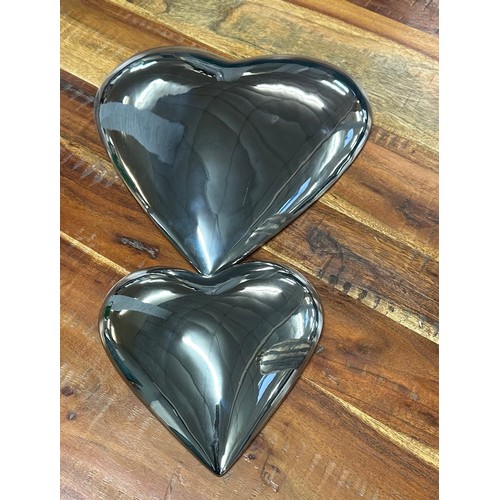 1376 - Two silver ceramic heart wall plaques