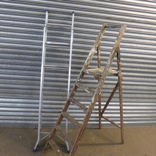 2225 - A double extending ladder with two sets of stepladders