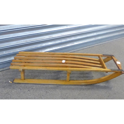 2235 - A vintage rustic traditional wooden sleigh