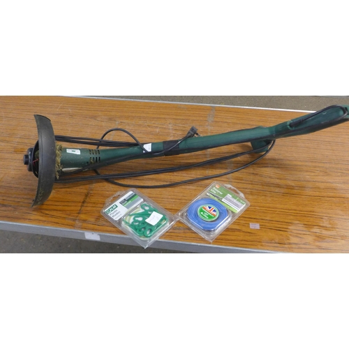 2238 - A 250w garden strimmer (FPET250-6), a pack of ALM plastic blades and a pack of trimmer line (1.5mm x... 