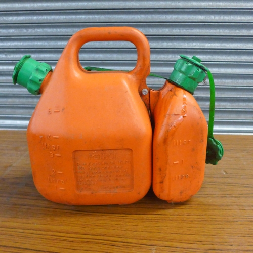 2241 - A metal oil can and a plastic oil can