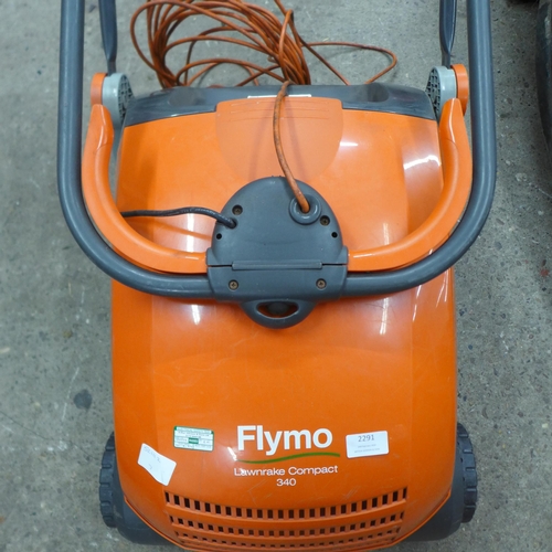 2291 - A Flymo Lawn Rake Compact 340 electric lawn rake